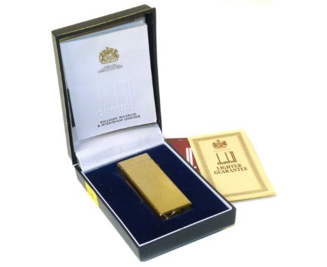 Dunhill gold plated cigarette lighter Condition reports are not available for the Interiors Sales.