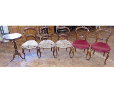 Three Victorian rosewood parlour chairs, two similar chairs and a tripod game table Condition reports are not available for t