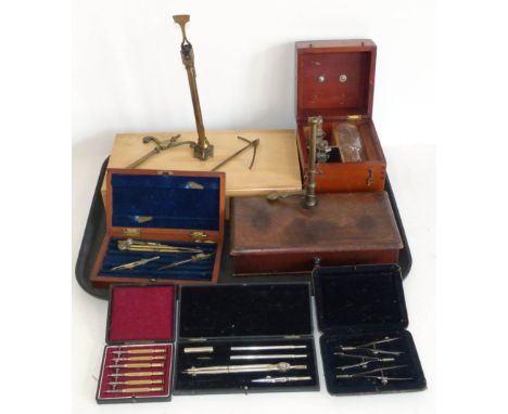 A set of "precision Moyenne" scales set incomplete, balance scales, four small part cases, drawing instruments and small port