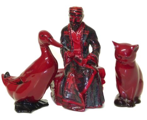 Royal Doulton Flambe Carpet Seller , a model of a cat and a mallard. Condition reports are not available for the Interiors Sa