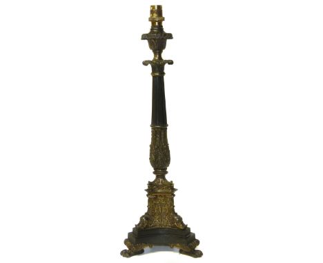 19th century cast bronze lamp base on paw feet. Condition reports are not available for the Interiors Sales.