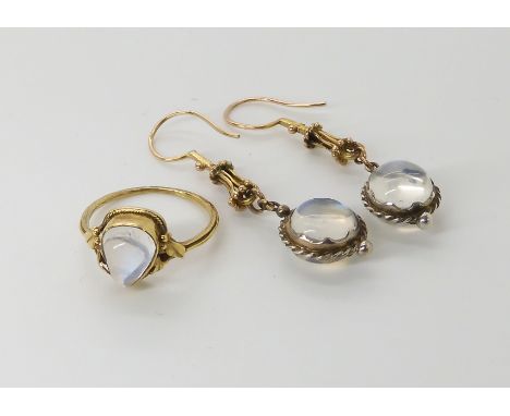 AN ARTS & CRAFTS YELLOW METAL AND MOONSTONE RING AND EARRINGS ring set with a pear shaped moonstone with leaf design to the s