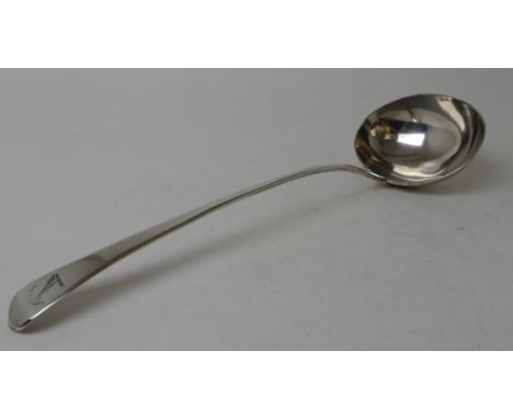 A SILVER SOUP LADLE by Wiliam Eley, London marks with oval bowl and plain stem bear a crest, 24cm long, 215gms Property from 