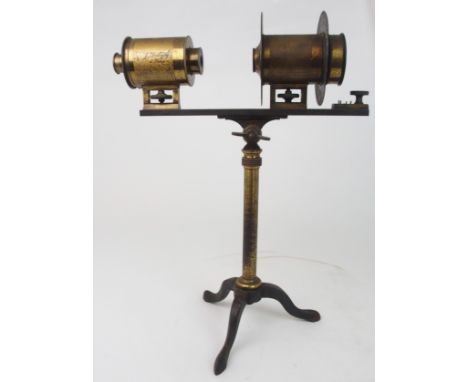 A VINTAGE FRENCH BRASS PROJECTING MICROSCOPE stamped, J Duboscq a Paris on tripos stand, 31cm wide x 48cm high Condition Repo