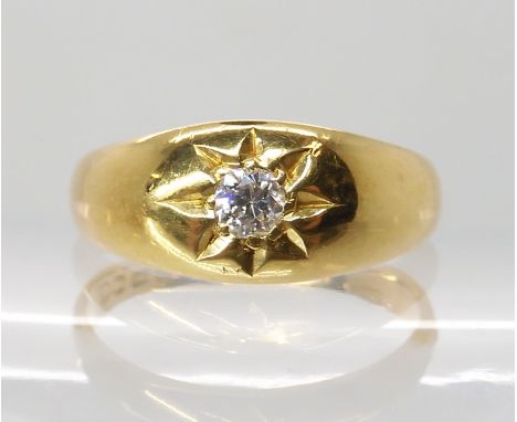 AN 18CT GOLD DIAMOND SET GYPSY RING set with an estimated approx 0.12cts old cut diamond in star setting, hallmarked London p