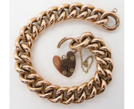 A 9CT ROSE GOLD CURB LINK BRACELET with heart shaped clasp, stamped 9c to the clasp and every link, length 19.5cm, weight 23.