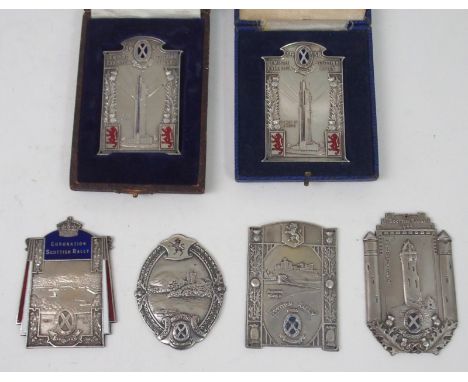 A COLLECTION OF SIX SCOTTISH RALLY WHITE-METAL AND ENAMEL PLAQUES comprising: 1934; 1935; 1936; 1937; and two 1938 Empire Exh