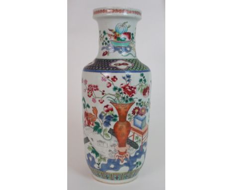 A CHINESE ROULEAU VASE painted with precious objects and flowers, with cell and trellis pattern shoulder and above a band of 