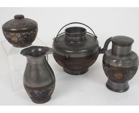 A CHINESE PEWTER AND COCONUT FOUR PIECE TEA SET comprising;tea pot, 13cm high, milk jug, 12cm high, sugar bowl, 8cm diameter,