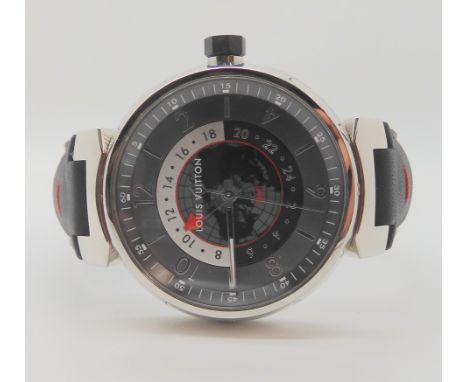 AN AS NEW LOUIS VUITTON GMT AUTOMATIC VOYAGE Q1D30with gun metal and silver coloured dial silver colour baton and Arabic nume