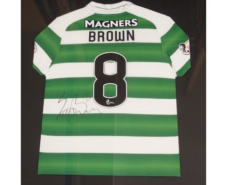 A GREEN AND WHITE  CELTIC SHIRT No.8, the reverse lettered Brown, also autographed by Scott Brown, 89 x 87cm overall All proc