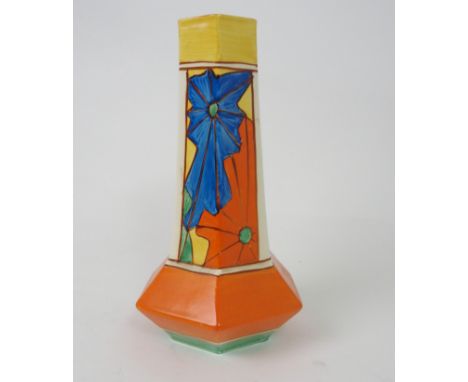 A CLARICE CLIFF FANTASQUE UMBRELLA PATTERN VASE the hexagonal shape body painted in colours, printed retailers mark for Lawle