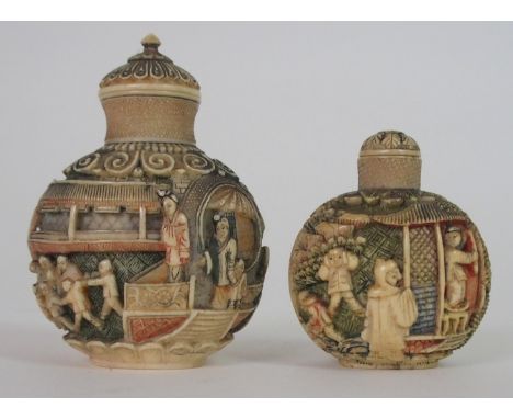 A CHINESE CARVED AND STAINED IVORY SNUFF BOTTLE decorated with figures on balconies and children playing within foliate bands