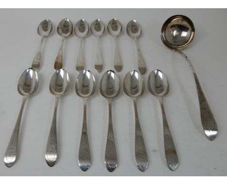 A SILVER SOUP LADLE maker's mark ID, Edinburgh 1786, the circular bowl with stem with bright cut decoration, the terminal bea