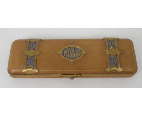 A LEATHER GILT-METAL AND ENAMEL GLOVE BOX inscribed Gants, with interior fitted glove stretchers, 27cm wide Condition Report:
