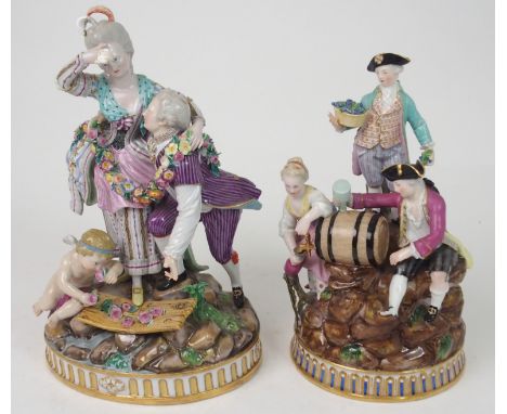 A MEISSEN GROUP OF A COUPLE modelled with a swag of flowers joining them, with a cherub at their feet, together with a group 