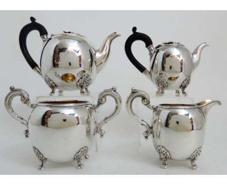 A FOUR PIECE SILVER TEA SERVICE by Richard Pearce and George Burrows, London 1839, of globular form, the cover with leafy fin