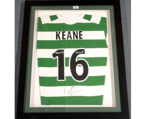 A GREEN AND WHITE REPLICA CELTIC SHIRT No.16, the reverse lettered Keane, also autographed by Roy Keane, with certificate of 