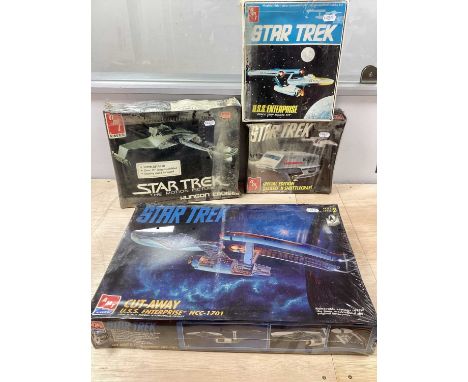 Four Star Trek Themed Plastic Model Kits by AMT/Ertl to include #8790 Cut-Away USS Enterprise NCC-1701, #6682 Klingon Cruiser