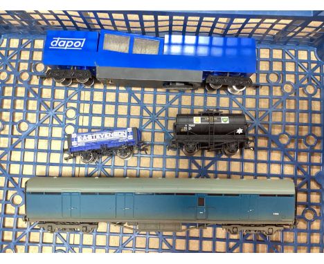 Four Items of OO Gauge Rolling Stock including Dapol Track Cleaner, Bachmann Thompson Full Brake and Two Bachmann Four Wheel 