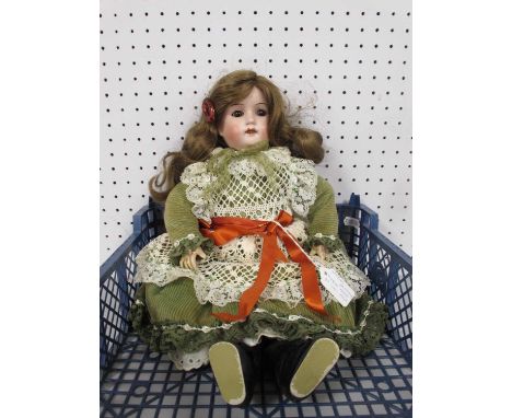 A Modern/Restored Bisque Headed Composition Doll stamped William Goebel Germany, the bisque head with open mouth detail (teet
