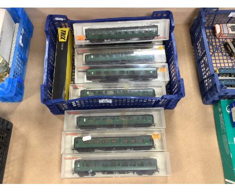 Nine HO Gauge British Outline Coaches by Fleischmann and Trix, all in Southern Region Green, Boxed.