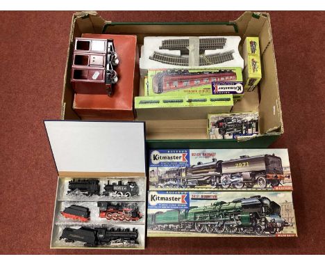 A Mamod Four Wheel Coach, four 'HO' scale model trains both American and Continental outline, Kitmaster kits, both started an