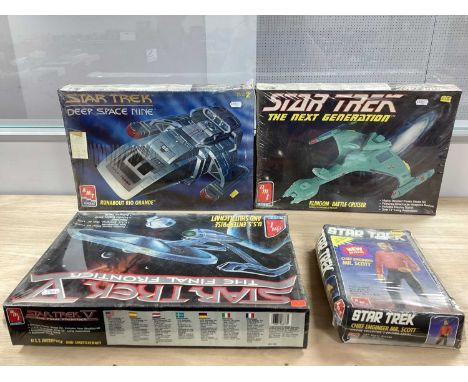 Three Star Trek Themed Plastic Model Kits by AMT/Ertl to include #6812 Klingon Battle Cruiser. #6876 U.S.S Enterprise and Shu