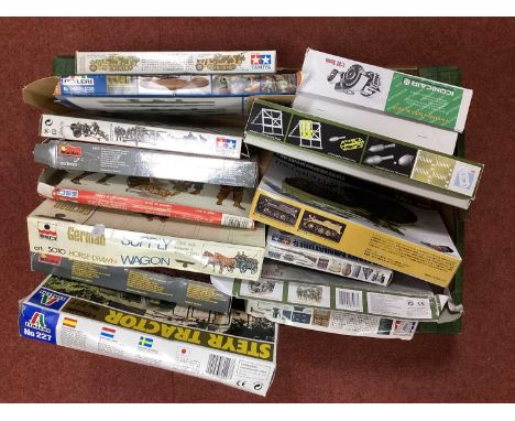 Fourteen predominantly 1:35 Scale Plastic Model Kits Featuring Vehicles and Military Personnel by Tamiya, Italeri, Dragon and