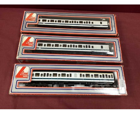 A Lima OO Gauge/4mm 3 Car Class 117 DMU, comprising power car, trailer and composite centre coach, BR white/blue R/No's W5134