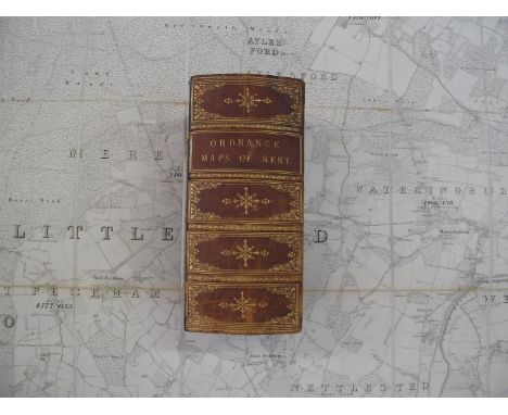 [KENT] a leather gilt book box (lacking lid) housing "Ordnance Maps of Kent, 7 folding sectioned linen-backed maps, ca. 1872