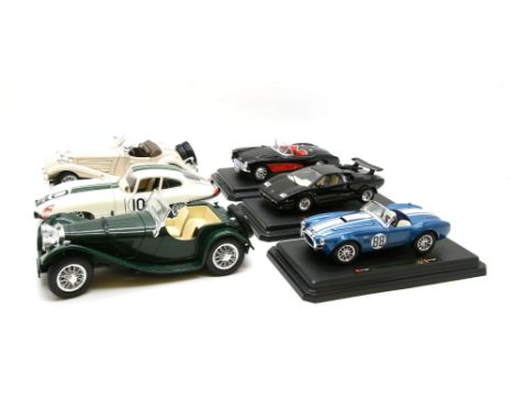 Eleven Burago die cast vehicles, 1/18 scale, to include a Jaguar R 1961, a Ford AC Cobra 427 1965, a Ferrari Testarossa 1984 