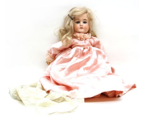 A 19th to early 20th century bisque head doll, by Hamburger &amp; Company Dolls, Marked H &amp; Co Viola, height 54cm