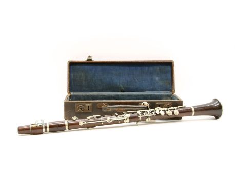 A rosewood clarinet by E A Chappell &amp; E Albert, inscribed S C Chappell sole agents, 52 Bond Street, London, with nickel k