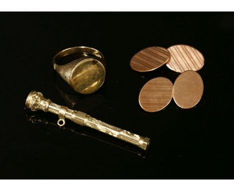 A gentlemen's gold signet ring, with vacant oval plaque and textured head to a plain polished shank, tested as approximately 