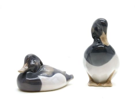 A pair of Royal Copenhagen ducks, 1924 and 1941, together with a collection of coloured glass and similar items, and an Art D