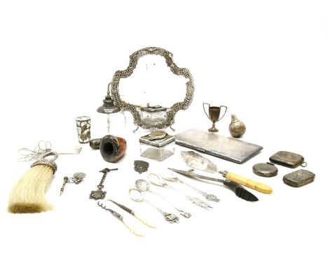 A quantity of silver, to include cut glass and silver atomiser, silver mounted comb brush, engine turned cigarette case