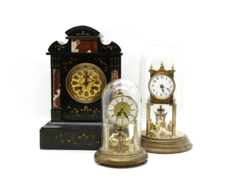 A Victorian marble architectural mantel clock, together with two brass anniversary clocks under glass domes (3)