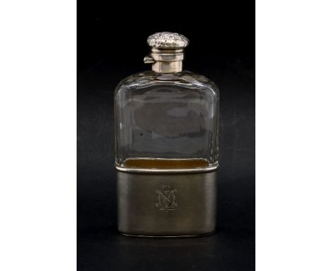 A Victorian silver and cut glass hip flask, London 1890, maker W N over G N, the silver top with repousse 'C' scrolls over a 