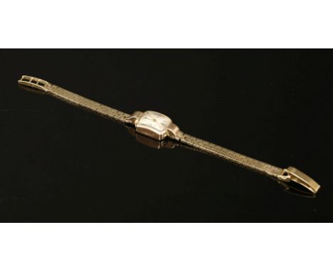 A ladies 9ct gold Tudor mechanical bracelet watch, movement signed Tudor, silver dial, Arabic pointer markers, with later 9ct