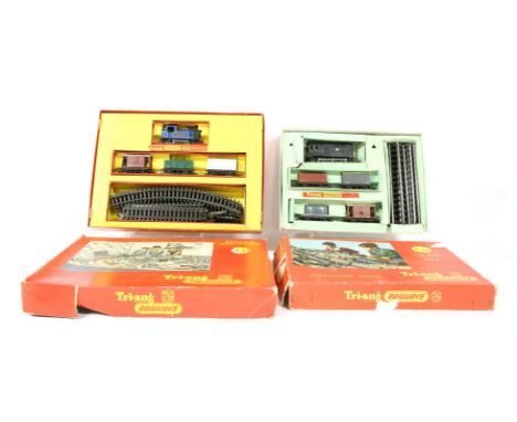 A Triang 00 guage R3Q clockwork model train set, complete in original box, together with a Triang S24 electric model railway
