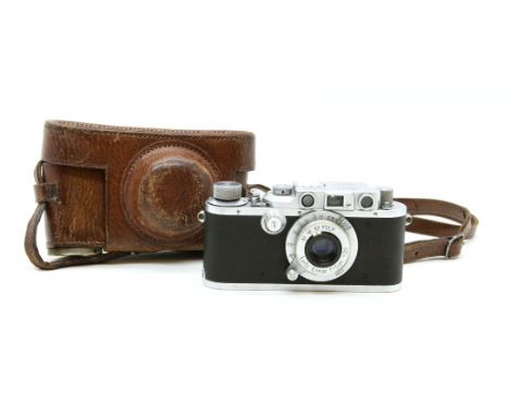 A Leica D.R.P. Ernst Leitz Wetzlar 35mm camera, Nr. 288237, with a Leitz Elmar f=5cm 1:3,5 lens, in a fitted leather carrying