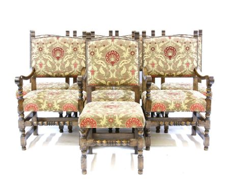 A set of eight Cromwellian style oak dining chairs, with two elbow chairs and 'tapestry' type upholstery