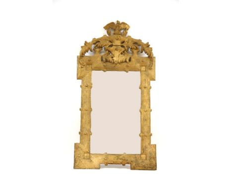 A 19th century giltwood mirror, having naturalistic frame depicting branches of a tree below a foliate pedestal, 140cm x 75cm