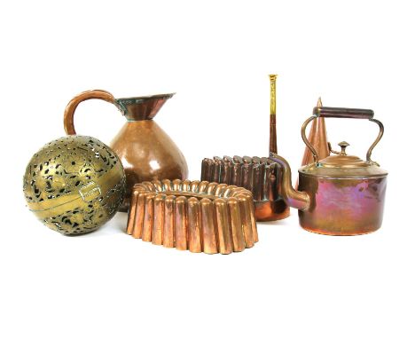 A collection of copper and brass items, to include a Benham &amp; Froud jelly mould, a similar jelly mould, a half-gallon ale