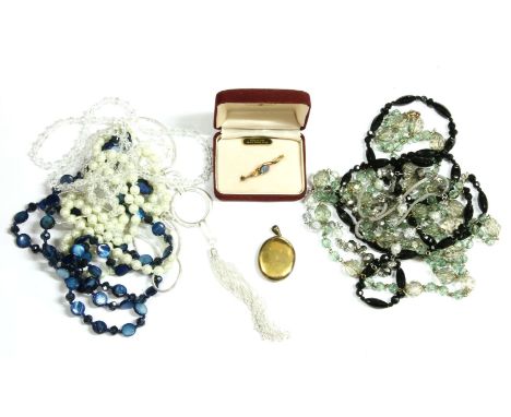 A collection of costume jewellery, to include a gold locket (tested as approximately 9ct gold), 8.28g, a silver gilt opal tri