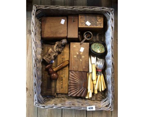 A basket containing a quantity of collectable items including wooden card and jewellery boxes, cribbage boards, cutlery, etc.