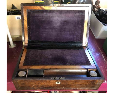 A Victorian rosewood veneered writing slope with metal stringing and mother-of-pearl inlay