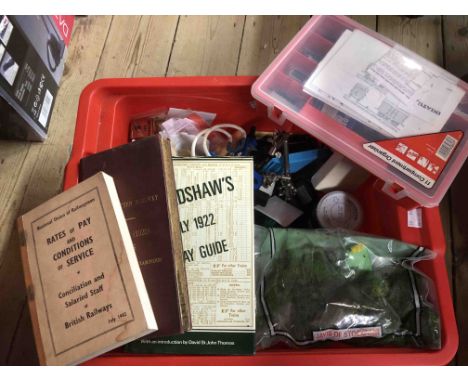 A box containing a quantity of railway and modelling related items including books, model engine parts, etc.
