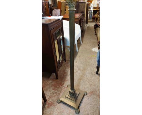 An old brass Corinthian column and telescopic oil lamp standard (converted to electricity), set on square stepped base with l